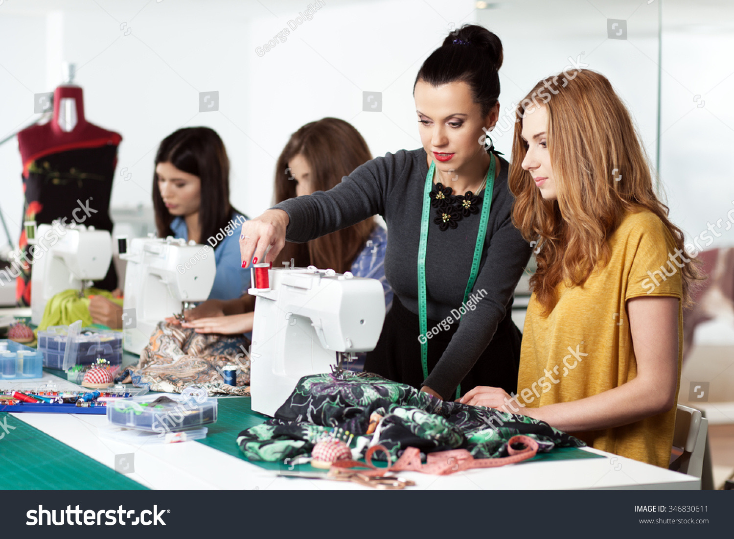 Group of women working together in a sewing workshop